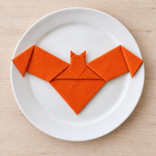 Chauve-souris à plat : corps triangulaire et pointes des ailes rabattues.